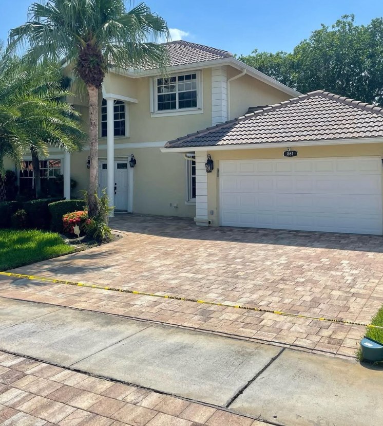 The same driveway after pressure washing, re-sanding, and sealing